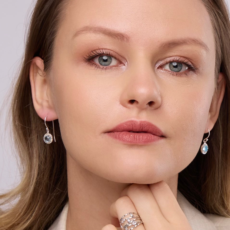 Diamond halo topaz earrings