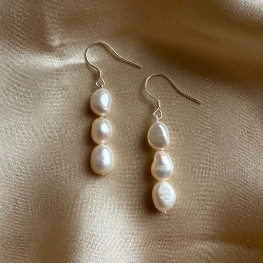Three baroque pearl drop hook earrings