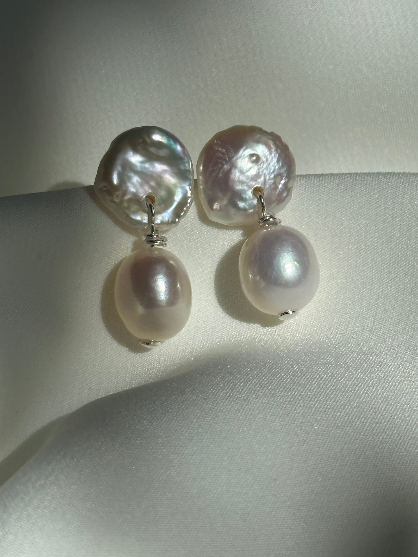 Double pearl stud earrings