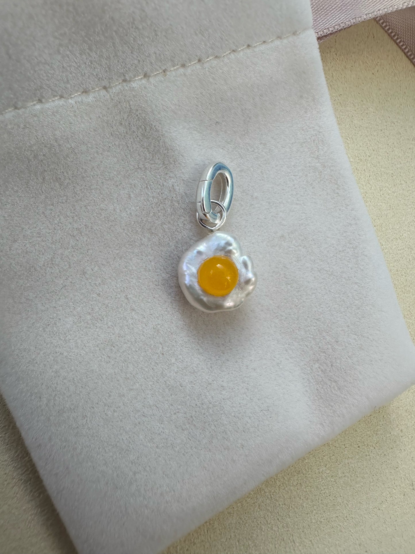 Fried egg keshi pearl and yellow jade charm