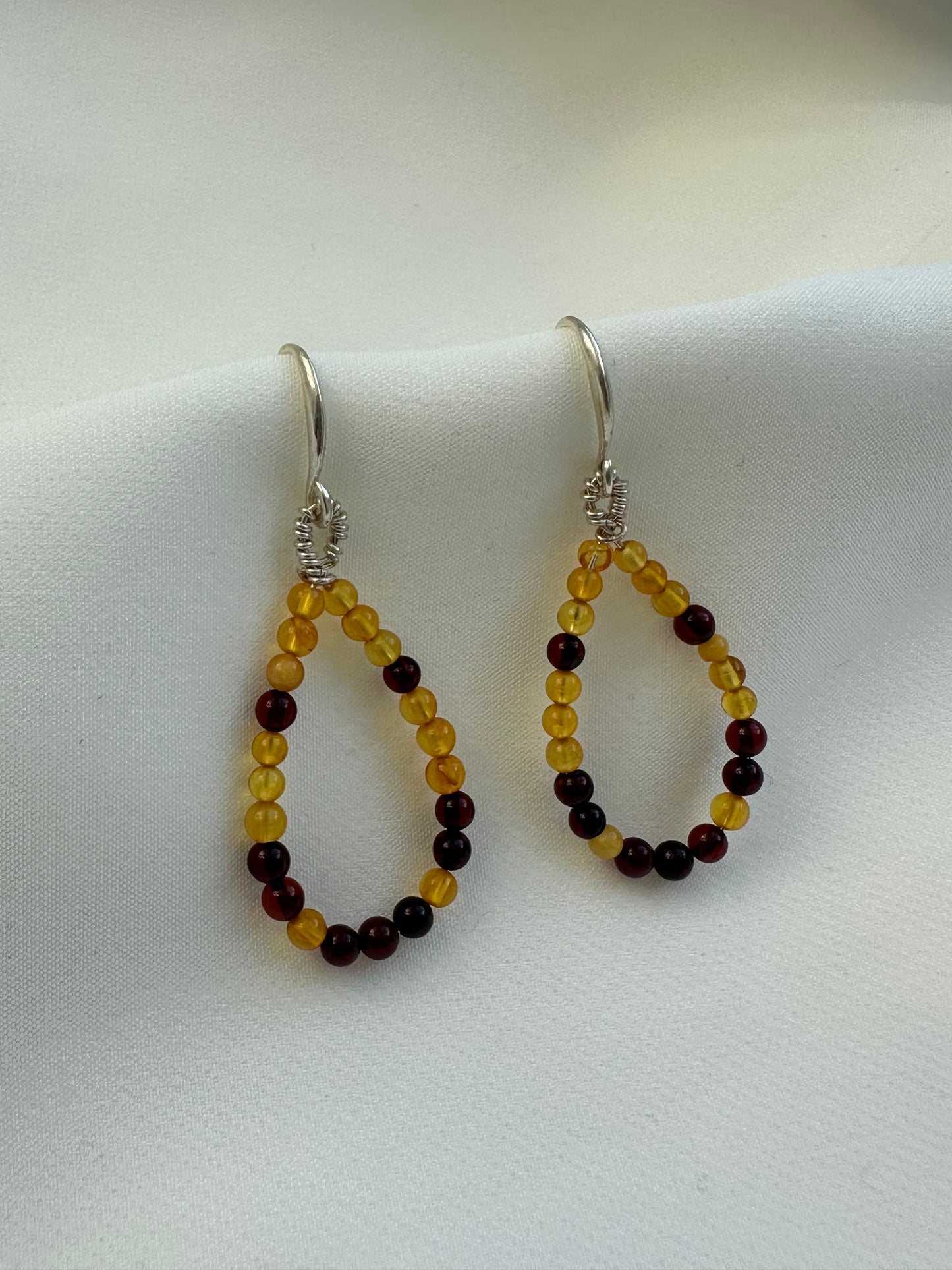 Teardrop baltic amber hook earrings