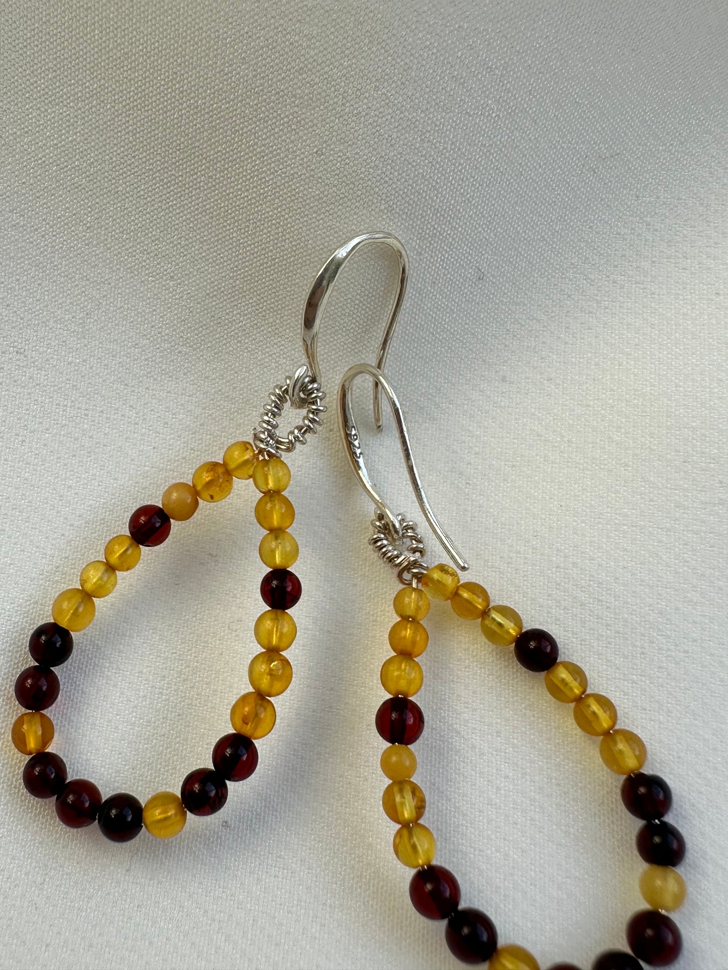 Teardrop baltic amber hook earrings