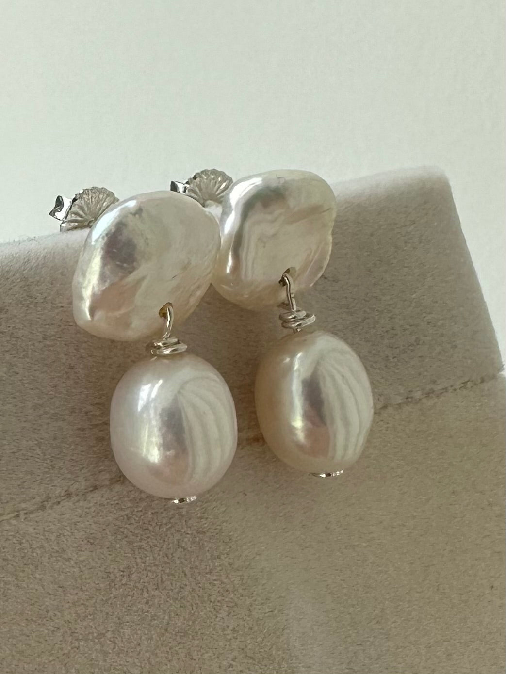 Double pearl stud earrings