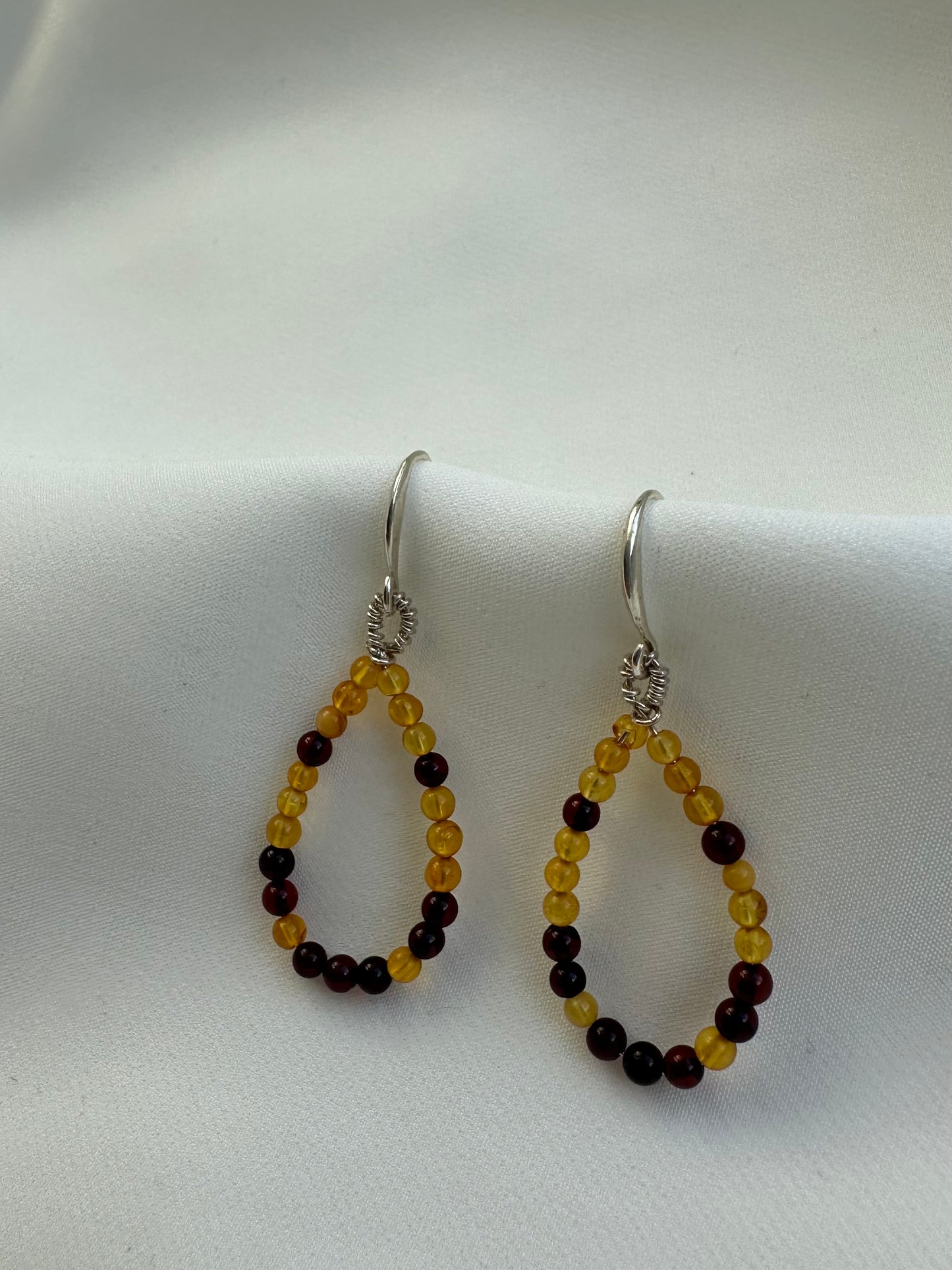 Teardrop baltic amber hook earrings