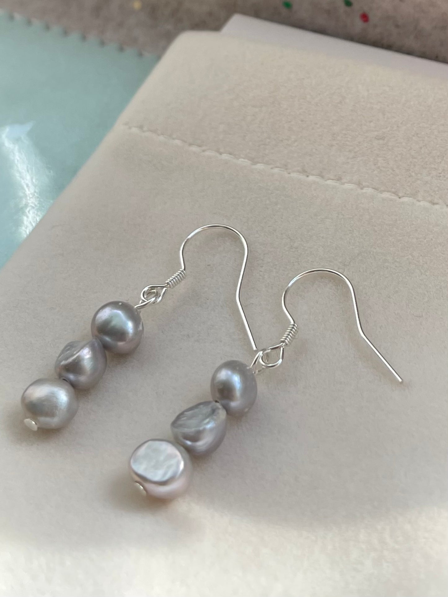 Three grey baroque pearl drop hook earrings