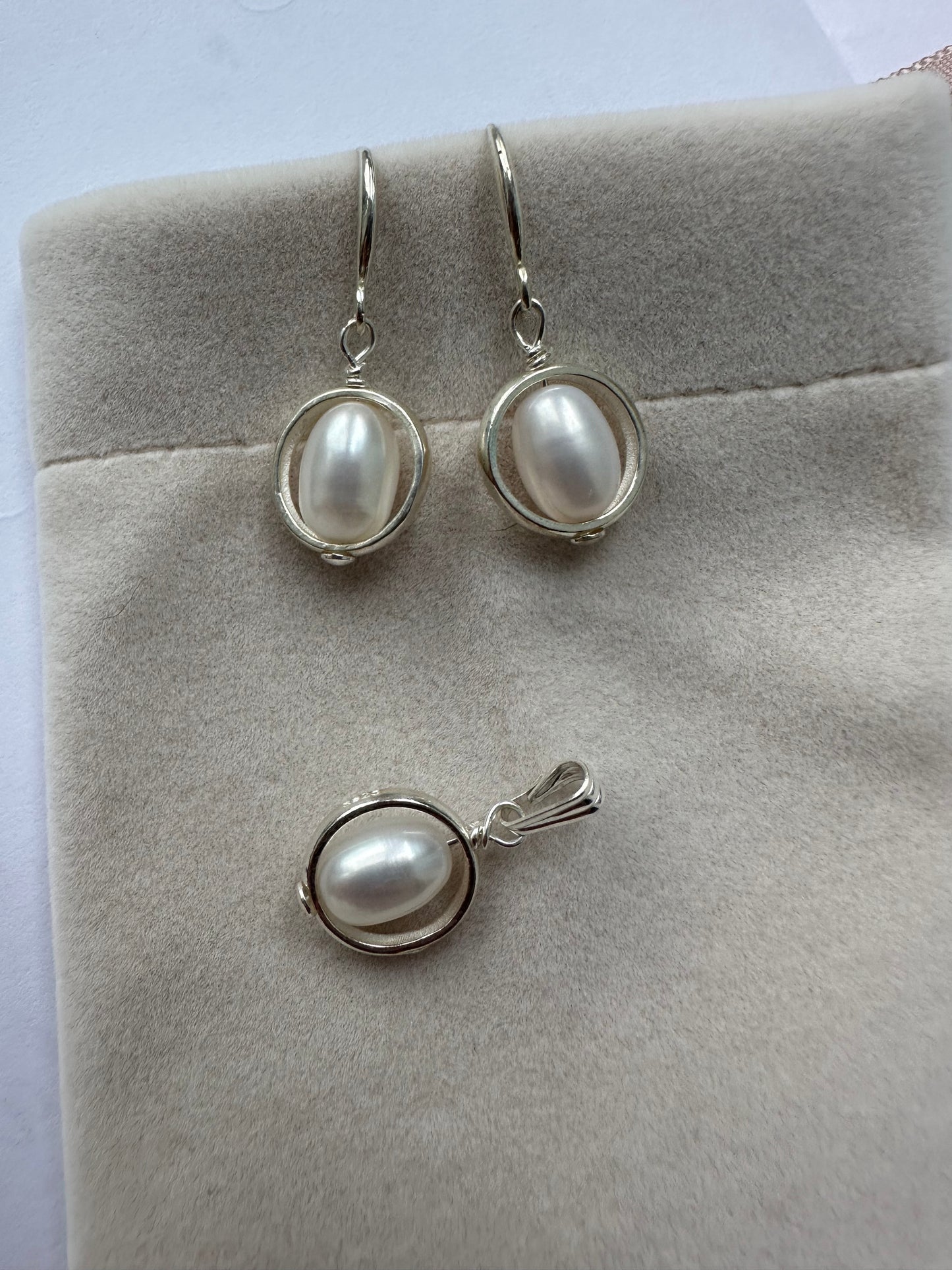 White pearl sphere gemstone earrings and pendant set