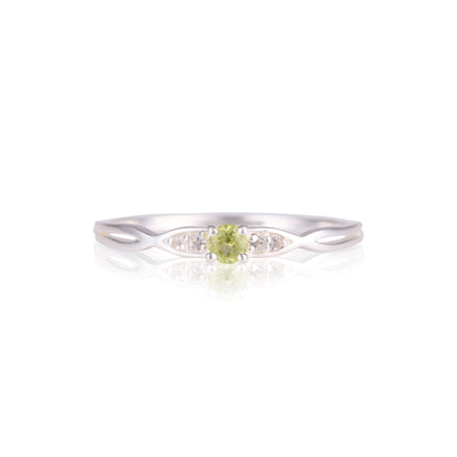 Peridot and white topaz silver ring