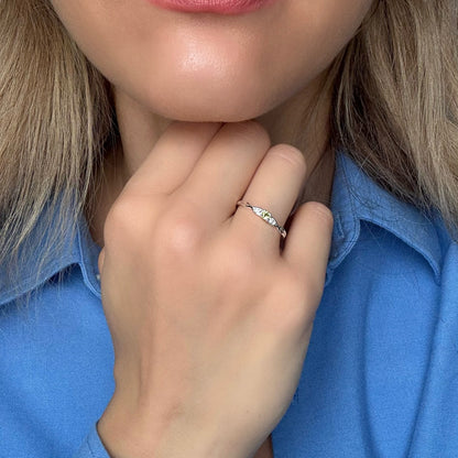 Peridot and white topaz silver ring