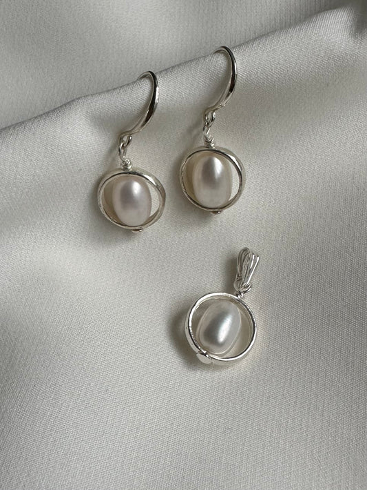 White pearl sphere gemstone earrings and pendant set