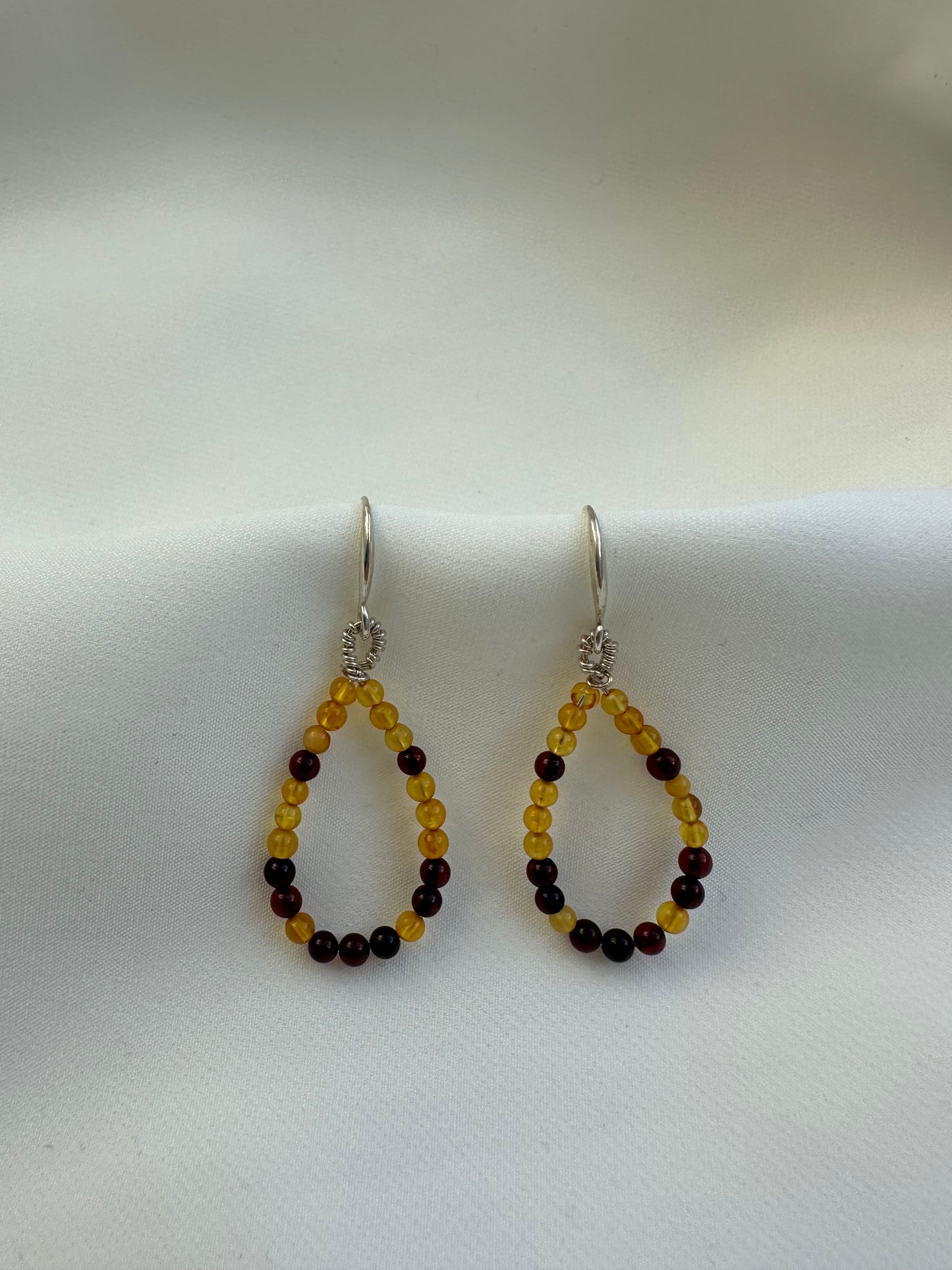 Teardrop baltic amber hook earrings